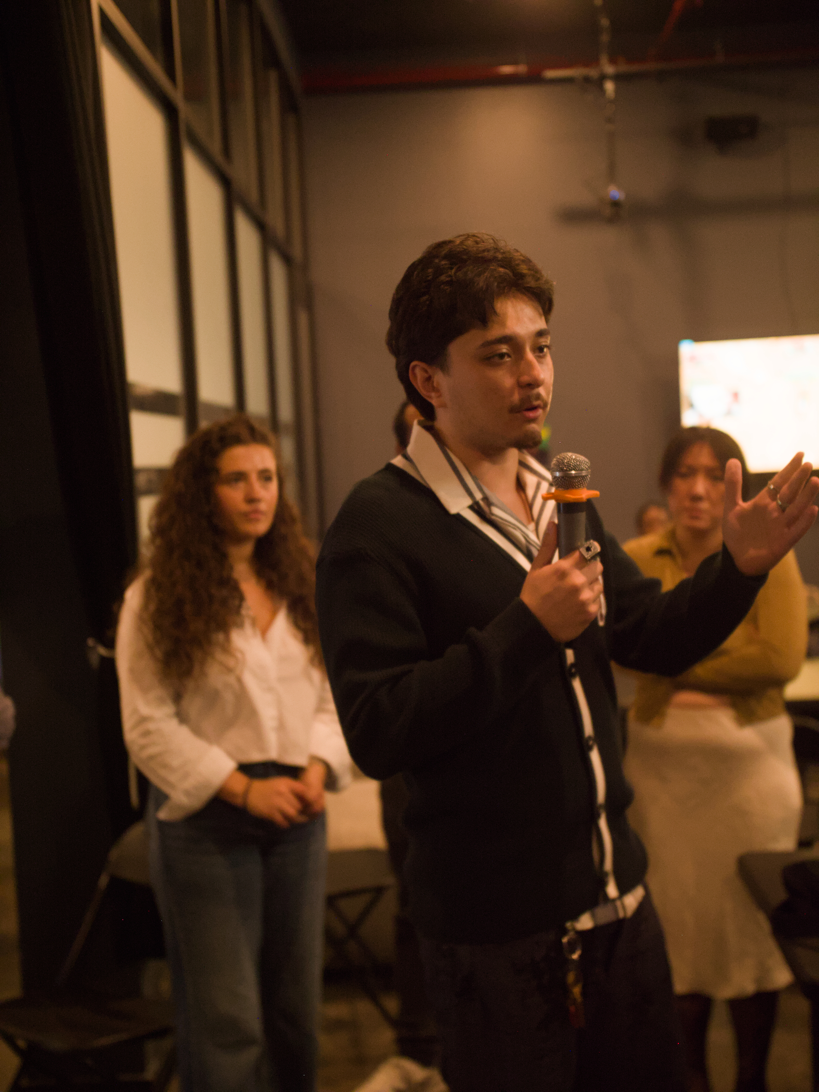 Ilias speaking at event